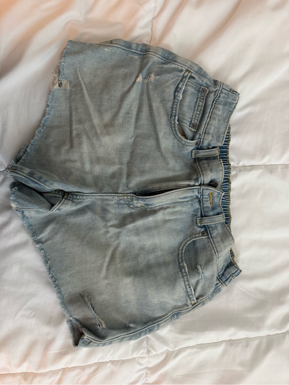 aerie light blue denim shorts with yellow topstitching